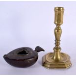 AN ARTS AND CRAFTS JUST CRUZIE BRONZE LAMP together with an 18th century candle stick. Largest 17 cm