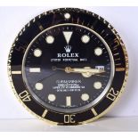 A ROLEX SHOP DISPLAY ADVERTISING WALL CLOCK. 33 cm diameter.