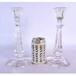 A PAIR OF ANTIQUE CUT GLASS CANDLESTICKS. 26 cm high.