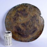 A 12TH/13TH CENTURY MIDDLE EASTERN KHOROSAN CIRCULAR TRAY decorated with motifs. 38 cm diameter.