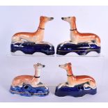 TWO PAIRS OF 19TH CENTURY STAFFORDSHIRE GREYHOUNDS. Largest 15 cm x 12 cm. (4)