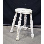 A 19th Century wooden dairy stool 45 cm