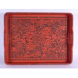 A LARGE EARLY 20TH CENTURY JAPANESE MEIJI PERIOD RED LACQUERED TRAY decorated all over with foliage