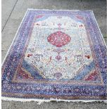 A large Oriental rug 465 x 306 cm.