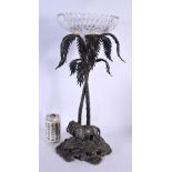 A LARGE ANTIQUE SILVER PLATED CUT GLASS CENTREPIECE formed as a tree above a roaming lion. 51 cm x 1