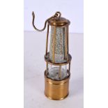 An early 20th Century miniature brass miner's lamp. 12cm.