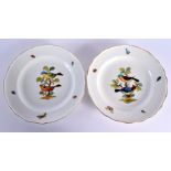 A PAIR OF 19TH CENTURY MEISSEN PORCELAIN ORNITHOLOGICAL PLATES painted with birds. 22 cm wide.