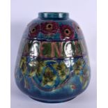 A FINE ARTS AND CRAFTS MORRIS WARE POTTERY VASE decorated with flowers and mottos. 21 cm x 15 cm.