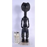 AN AFRICAN TRIBAL CARVED WOOD FERTILITY FIGURE. 41 cm high.