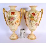 A LARGE PAIR OF ROYAL WORCESTER TWIN HANDLED BLUSH IVORY VASES. 38 cm x 20 cm.