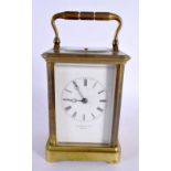 A SMALL LATE 19TH CENTURY FRENCH REPEATING BRASS CARRIAGE CLOCK Mercier et Fils. 15 cm high inc hand