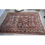 A large Oriental rug. 306 x 215cm.