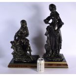 TWO LARGE 19TH CENTURY EUROPEAN BRONZED TERRACOTTA FIGURES modelled upon faux wood bases. Largest 60