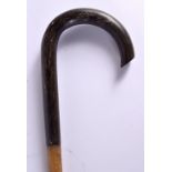 A 19TH CENTURY MIDDLE EASTERN CARVED RHINOCEROS HORN FULL LENGTH CANE. 311 grams. 90 cm long.