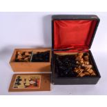 A BOXED ANTIQUE BOXWOOD AND EBONY CHESS SET together with another similar. Largest 11 cm high. (qty)