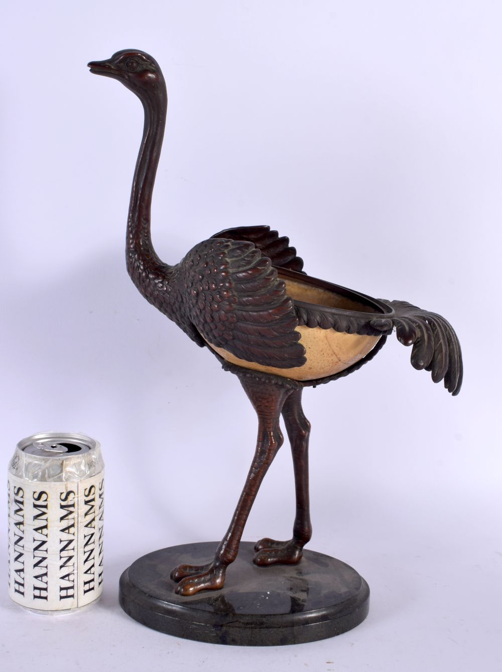 AN UNUSUAL 19TH CENTURY CONTINENTAL BRONZE FIGURE OF AN OSTRICH EGG formed with an ostrich egg body.