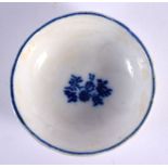 AN UNUSUAL 18TH CENTURY ENGLISH BLUE AND WHITE MINIATURE TOY SAUCER painted with sprigs. 5.75 cm dia