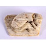 A 19TH CENTURY JAPANESE MEIJI PERIOD CARVED BONE NETSUKE. 4 cm x 2.5 cm.