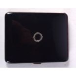 A BLACK ENAMEL CARD CASE. 8.5CM X 6.8CM X 1.4CM, WEIGHT 73.3G