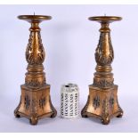 A PAIR OF CONTINENTAL GILTWOOD TYPE PRICKET CANDLESTICKS. 36 cm high.