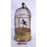 A LARGE 19TH CENTURY EUROPEAN GILT METAL SINGING BIRD AUTOMATON BIRD CAGE decorated with scrolls. 50