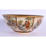 A FINE 19TH CENTURY JAPANESE MEIJI PERIOD SATSUMA BOWL painted with figures in landscapes. 12 cm wid