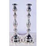 A PAIR OF SILVER CANDLESTICKS. Hallmarked London 1933, 32cm x 11.5cm, total weight 502g (2)
