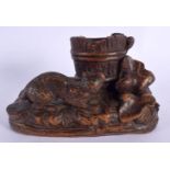 A 19TH CENTURY BAVARIAN BLACK FOREST DESK STAND formed with a roaming fox. 14 cm x 9 cm.