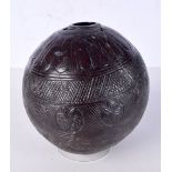 A carved Coconut flask 16 cm.