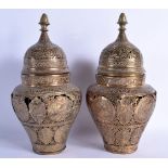 A PAIR OF EARLY 19TH CENTURY MIDDLE STERN OPEN WORK VASES decorated with figures and animals. 28 cm