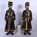 A LARGE PAIR OF CONTEMPORARY COLD PAINTED BRONZE COSSACKS. 40 cm high.