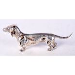 A VINTAGE CONTINENTAL SILVER DOG. 50 grams. 9 cm x 3.5 cm.