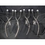 A collection of large chrome antler style wall lights 65 cm. (4)