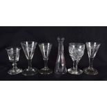 FIVE ANTIQUE WINE GLASSES and another. Largest 12 cm high. (6)