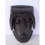 A West African tribal mask 32 x 20 cm.