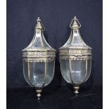 A pair of storm lanterns with open work metal decoration 64 cm (2).