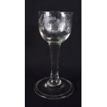 AN ANTIQUE WINE GLASS. 13 cm high.