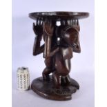 AN AFRICAN TRIBAL FIGURAL STOOL. 40 cm x 24 cm.