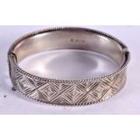 A 1960S SILVER BANGLE. 27 grams. 6 cm x 5 cm.