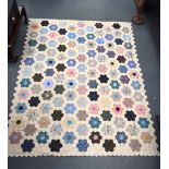 A vintage patchwork quilt 230 x 180 cm.