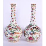 A PAIR OF 19TH CENTURY CHINESE FAMILLE ROSE CLOBBERED VASES Qing. 17 cm high.