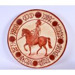 A RARE ARTS AND CRAFTS ENGLISH IRON RED PAINTED POTTERY PLATE in the manner of William De Morgan, in