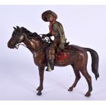 A RARE 19TH CENTURY AUSTRIAN COLD PAINTED BRONZE FIGURE OF A COWBOY modelled upon a horse. 12 cm x 1