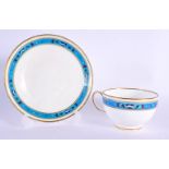 Late 19th century Minton teacup and saucer painted with a turquoise band decorated in the style of C