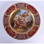 A FINE ANTIQUE VIENNA PORCELAIN CABINET PLATE depicting classical scenes. 24 cm diameter.