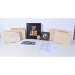 A collection of WW 1 Medals, DSO, Victory Medal, Star with Oak leaf, British war medal, associated d