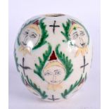 A TURKISH KUTAHYA FAIENCE HANGING MOSQUE BALL painted with portraits. 8 cm x 6 cm.