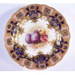 Royal Worcester plate painted with fruit under a cobalt blue and gilt border by E. Phillips, signed