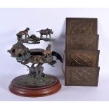 AN ARTS AND CRAFTS LETTER RACK together with an animal sculpture. Largest 28 cm x 10 cm. (2)