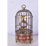 A small bird cage clock with enamelled decoration 17 cm.